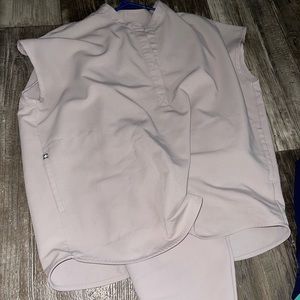 Figs scrubs for sale. Xl tall bottoms and large tops. 50$ a set.